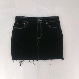 Black denim skirt
